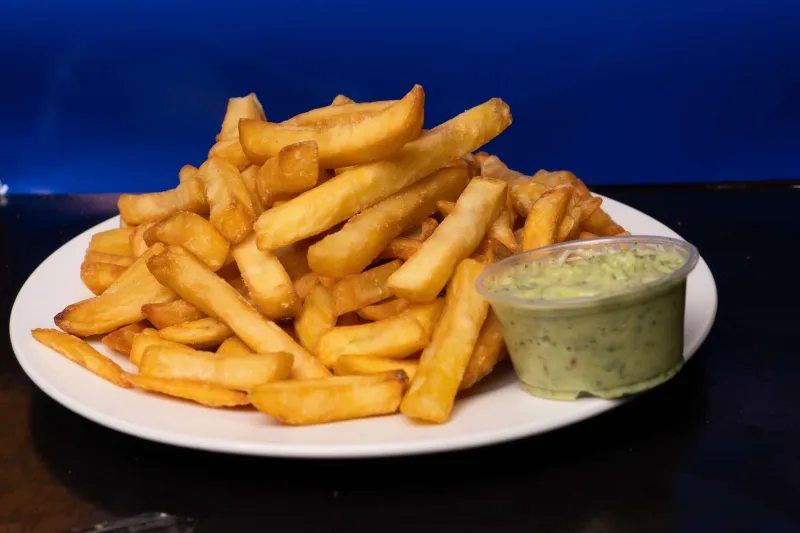 Thick, Yellow, and Non-Negotiable: The Curry Sauce Secrets Britain's Chip Shops Will Take to Their Graves
